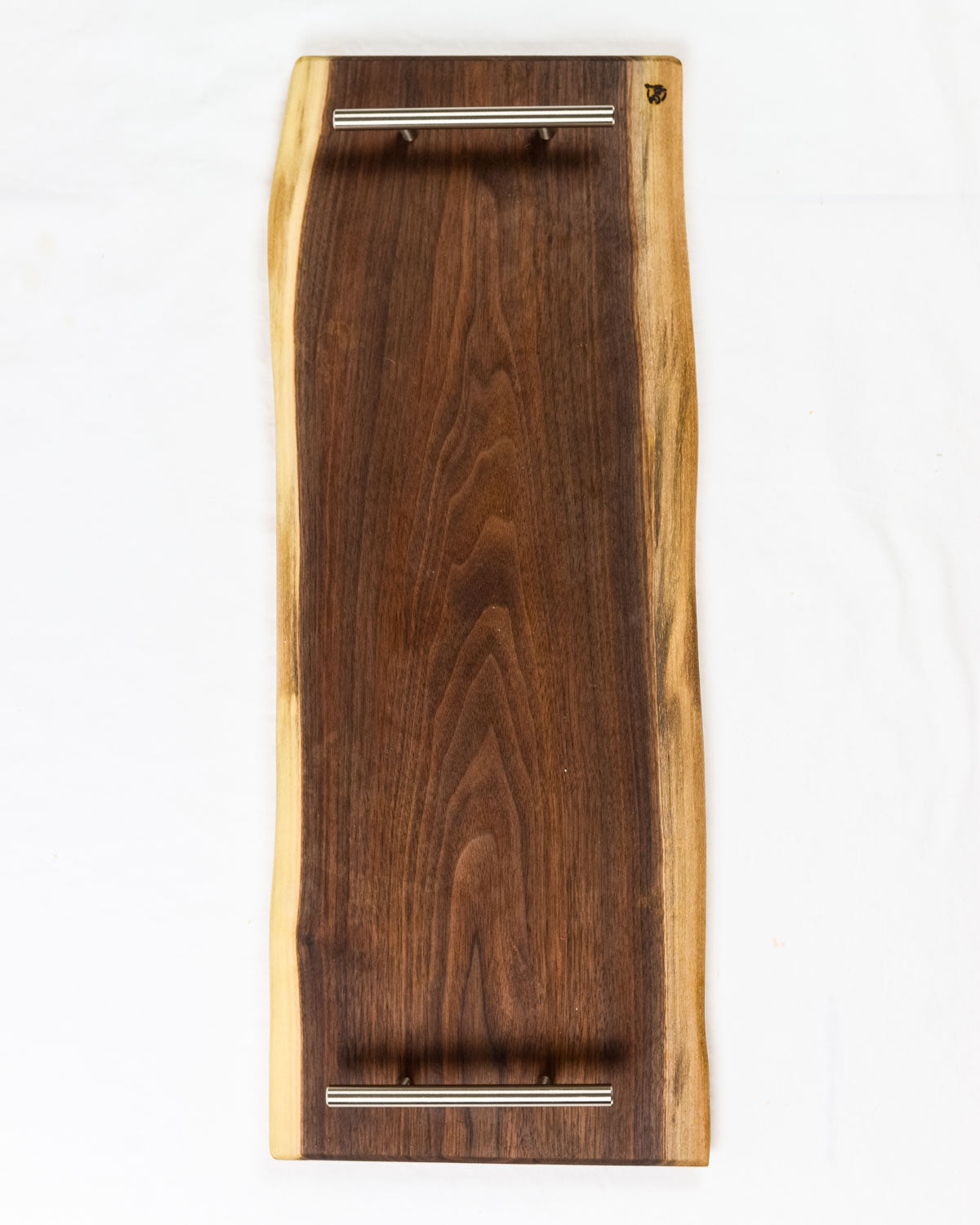 These Walnut Live Edge Serving Trays are the perfect choice when serving your favorite charcuterie on a beautiful wood tray. Each piece is unique, showing the grain patterns to create true art straight from nature.