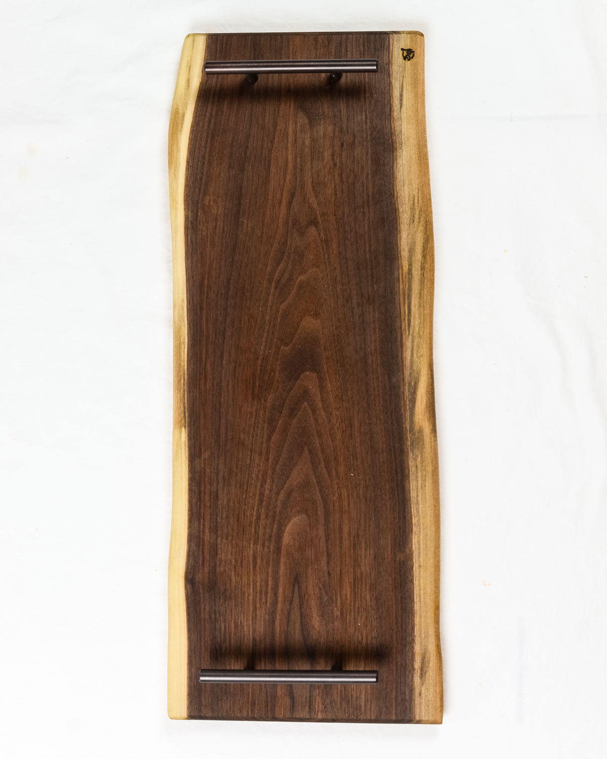 These Walnut Live Edge Serving Trays are the perfect choice when serving your favorite charcuterie on a beautiful wood tray. Each piece is unique, showing the grain patterns to create true art straight from nature.