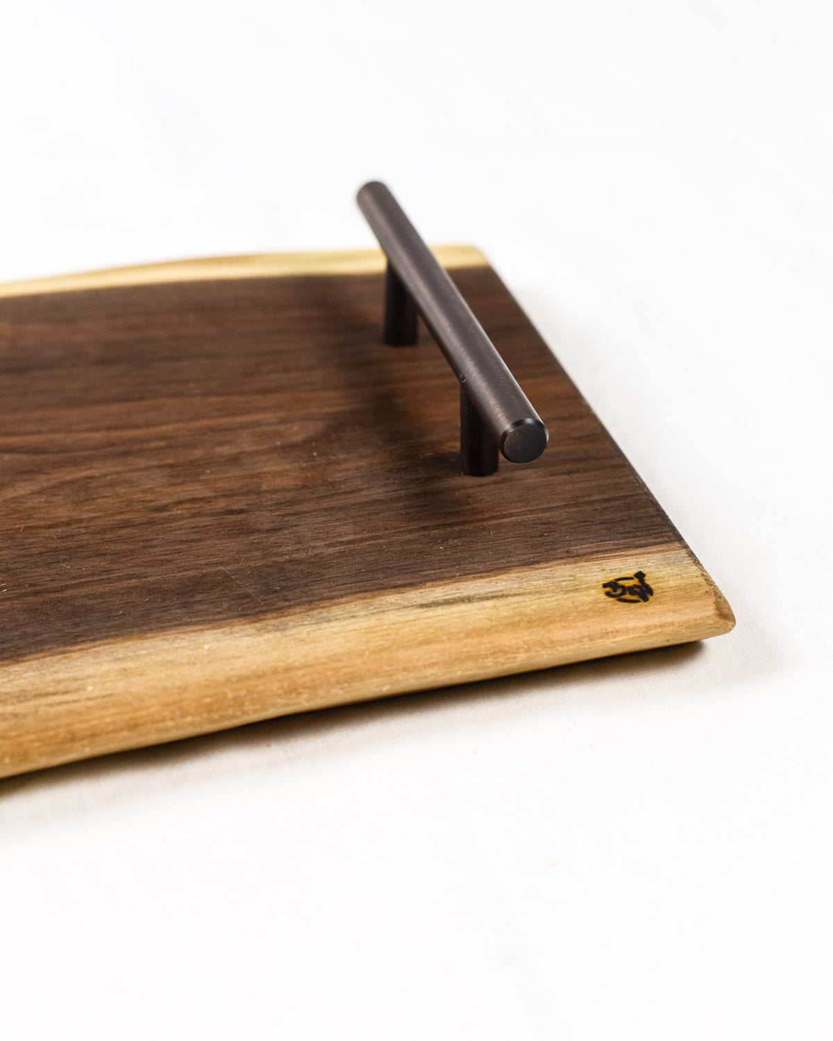 These Walnut Live Edge Serving Trays are the perfect choice when serving your favorite charcuterie on a beautiful wood tray. Each piece is unique, showing the grain patterns to create true art straight from nature.