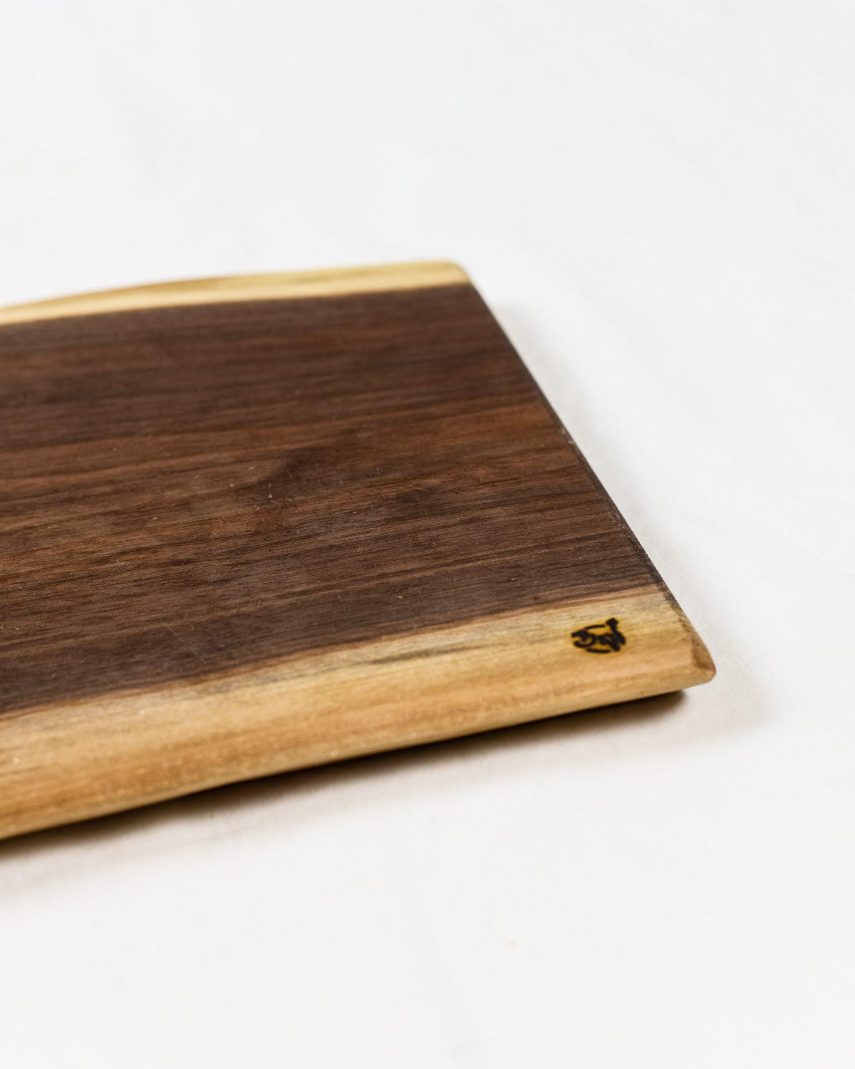 These Walnut Live Edge Serving Trays are the perfect choice when serving your favorite charcuterie on a beautiful wood tray. Each piece is unique, showing the grain patterns to create true art straight from nature.