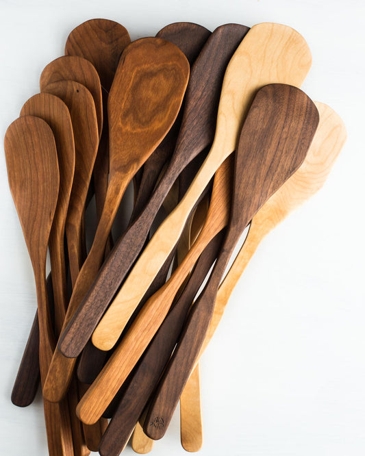 The curved sides of this wooden spatula, along with the long handle help you get into tight spots easily in tall pans and deep bowls.